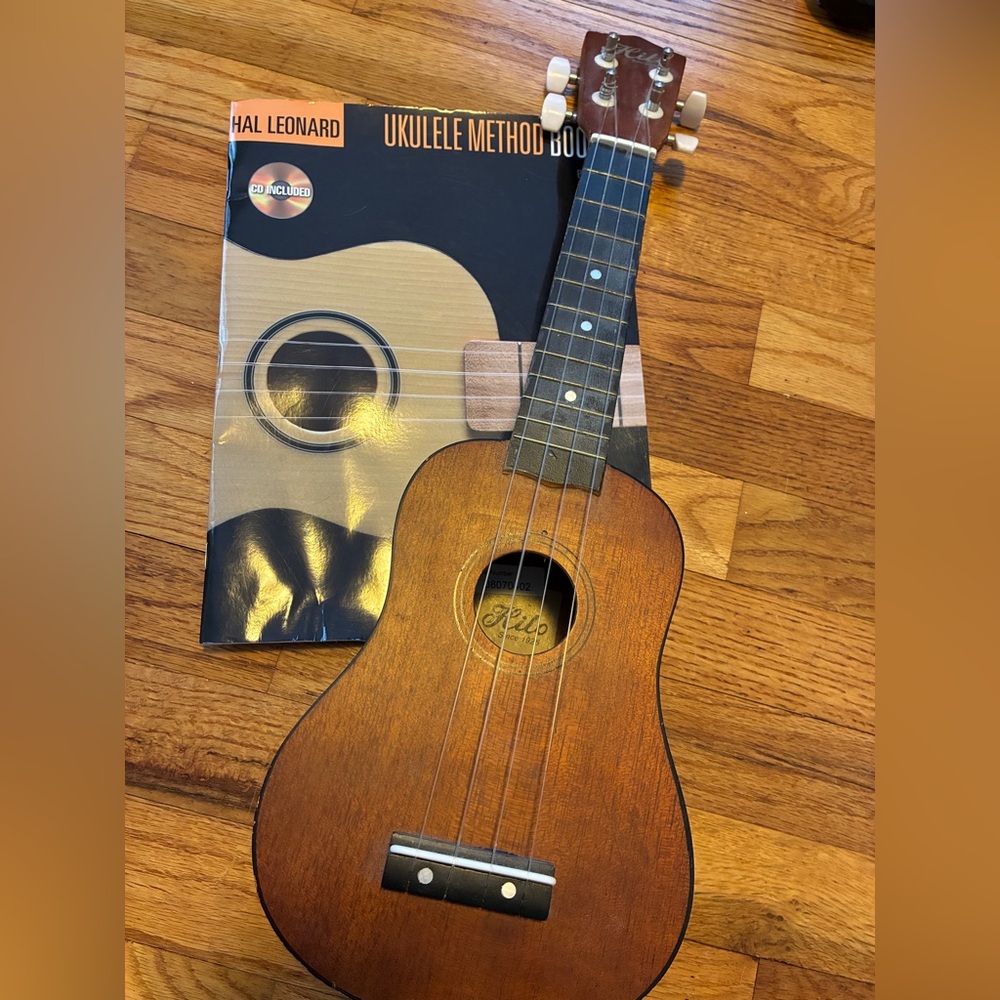 Ukulele with book
